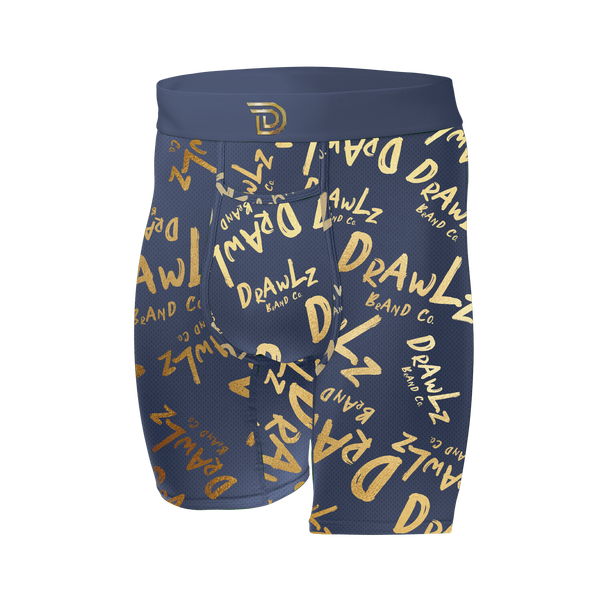 Anniversary Signature — men's navy boxer briefs with gold Drawlz-script print, limited edition