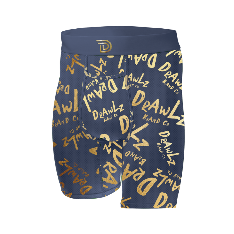 Anniversary Signature — men's navy boxer briefs with gold Drawlz-script print, limited edition