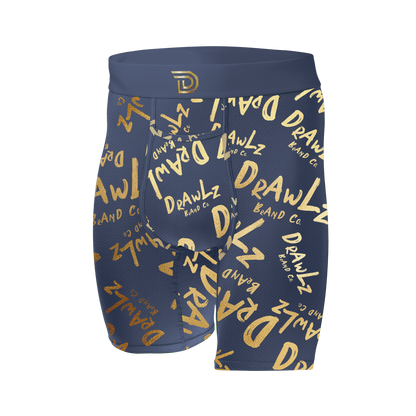 Anniversary Signature — men's navy boxer briefs with gold Drawlz-script print, limited edition