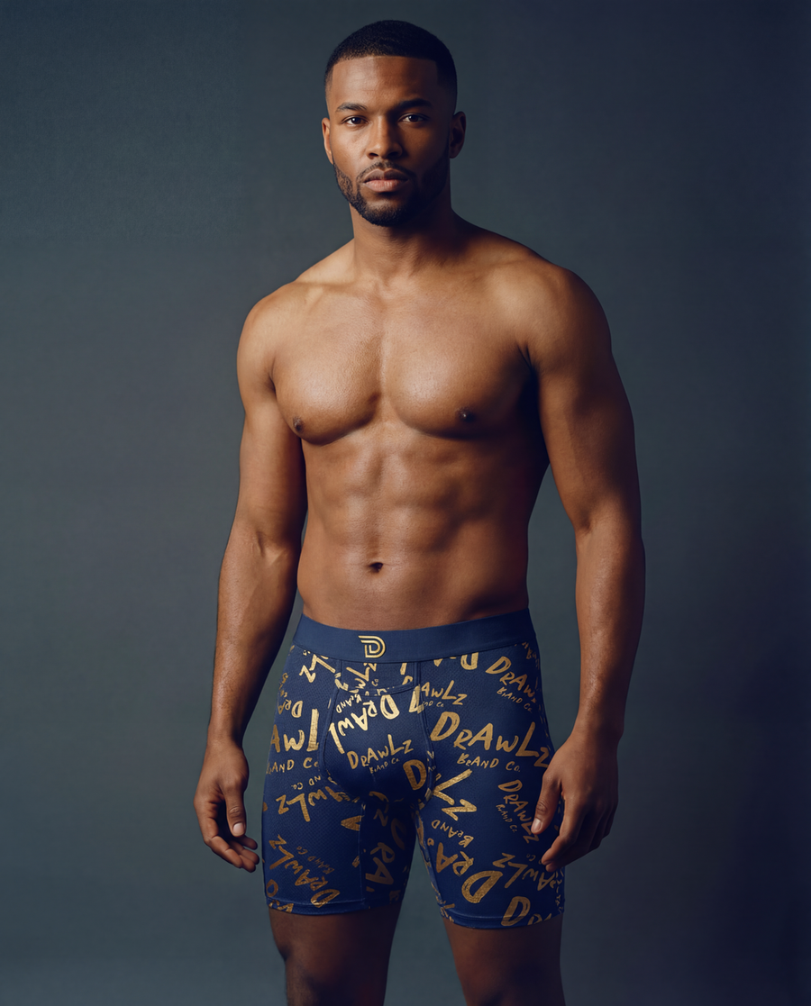 Anniversary Signature — men's navy boxer briefs with gold Drawlz-script print, limited edition, additional view